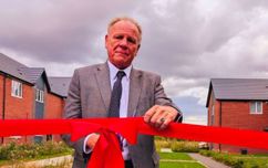 Cllr Les Phillimore Cutting The Ribbon To Open Frost Court