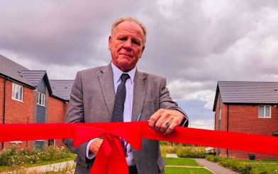 Cllr Les Phillimore Cutting The Ribbon To Open Frost Court